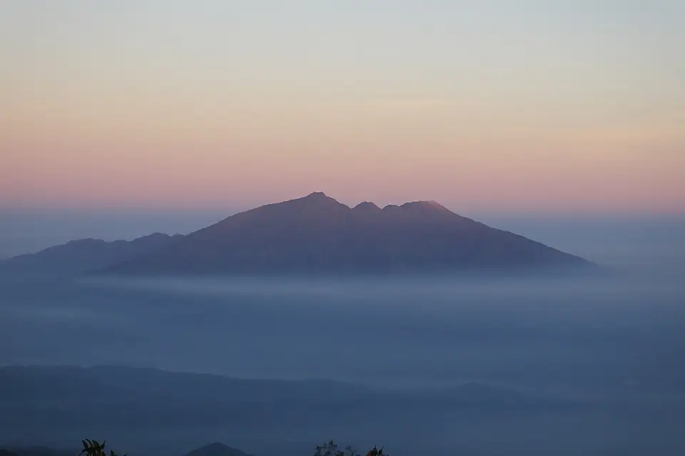 Arjuna in fog from Mount Penanjakan 2