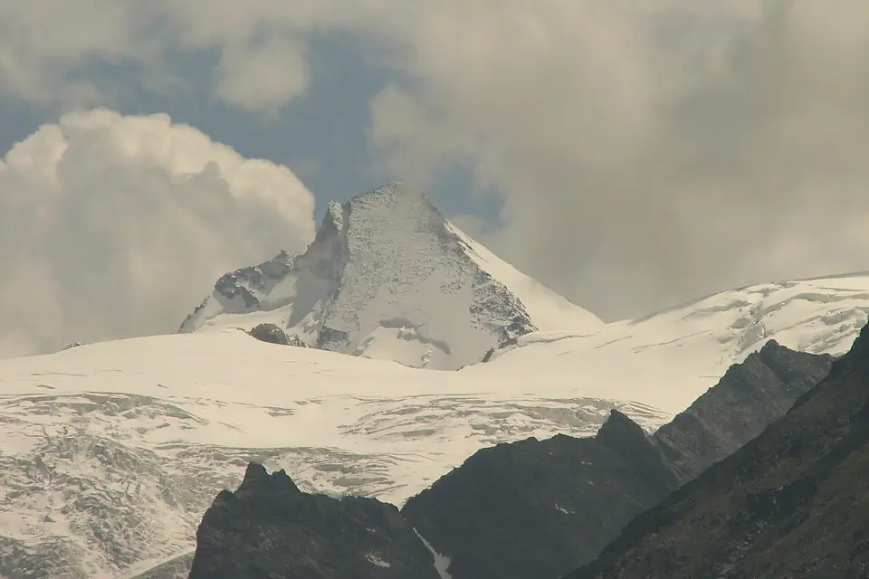 Dent d'Herens 4171m as seen from the centre of Evolene and the nearby campsite - panoramio