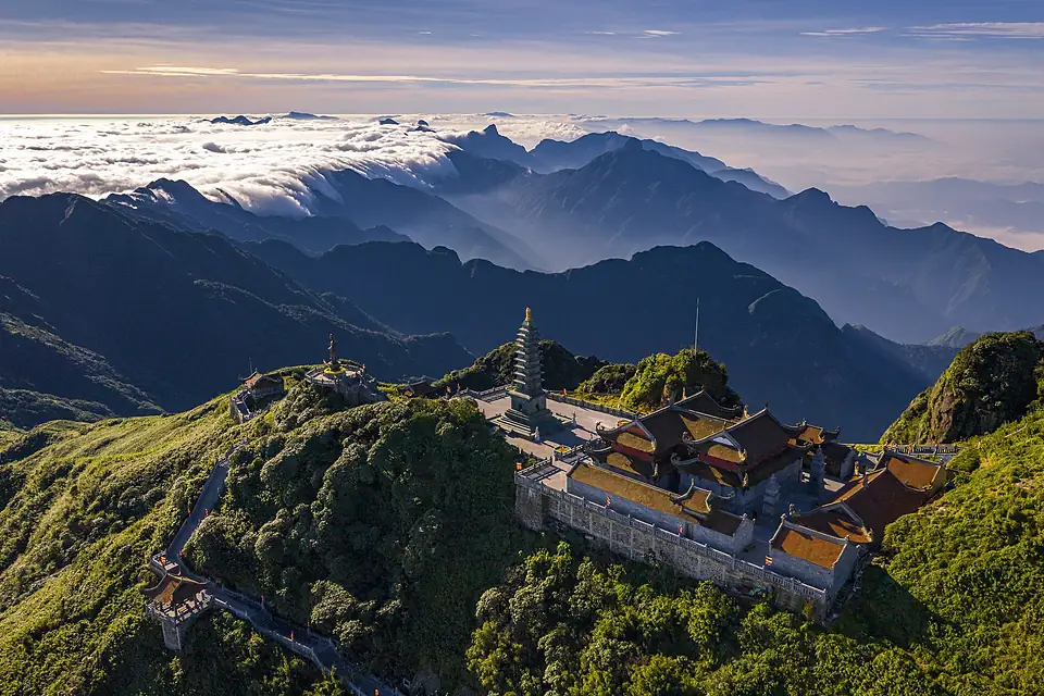 Fansipan summit pagoda stupa sea of clouds aerial view Sa Pa Vietnam