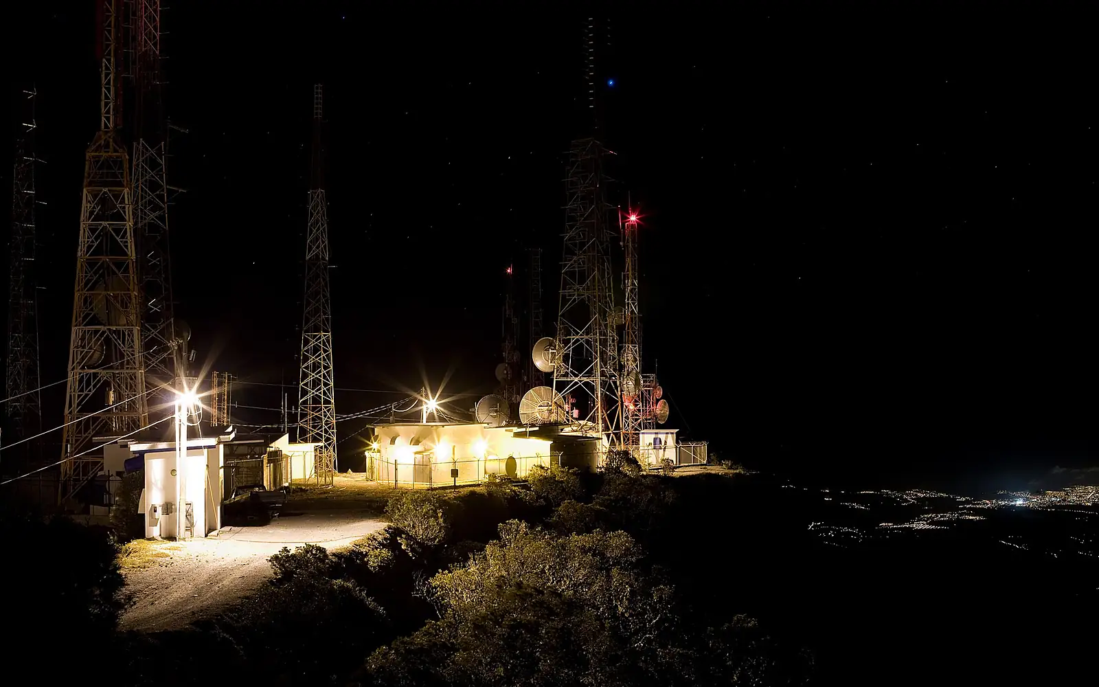 Buildings on Volcan Baru overlooking the city of David at night.